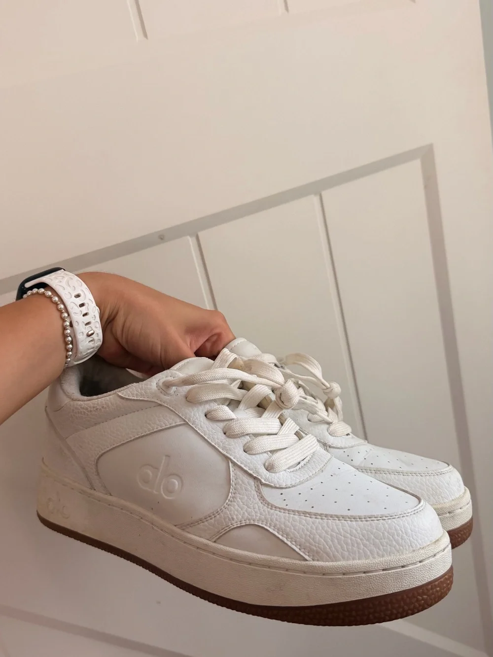 ALO Yoga Women's Off-White Sneaker with Brown Sole